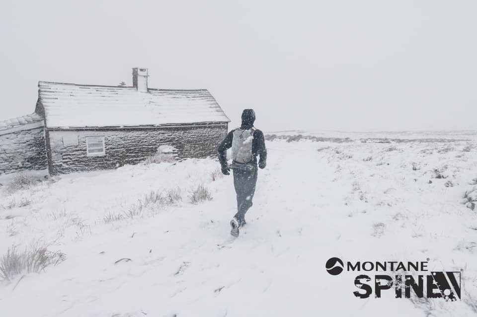 Eugeni arrives at a snowy Greg's Hut after going over Cross Fell. Inside John Bamber's legendary chilli noddle bar awaits the tired runners before the descent into Garrigill and the South Tyne