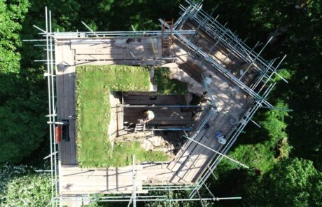 Image of top of Kirkoswald castle surrounded by scaffolding