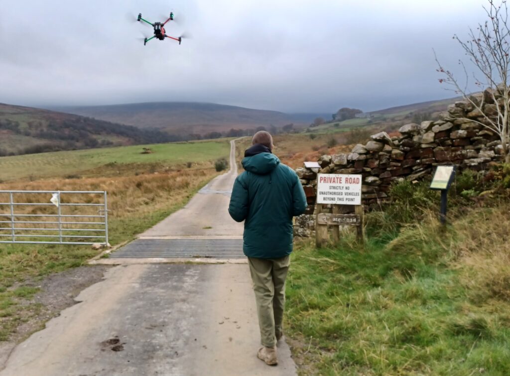 Man controlling a drone used for deer monitoring