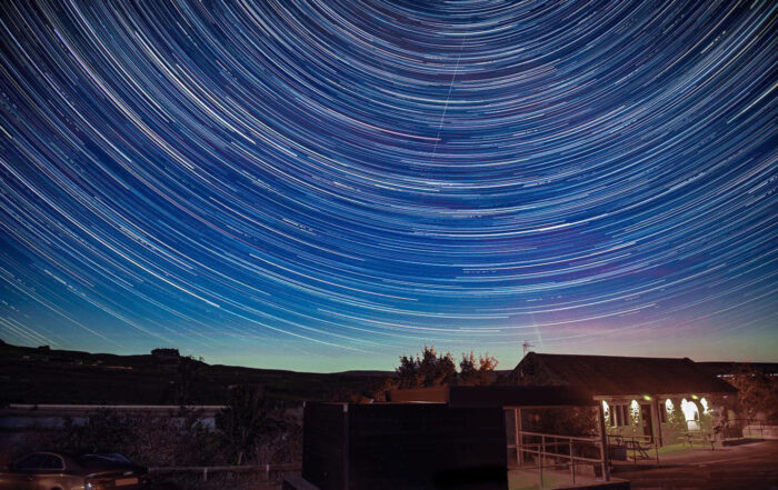 Star trails on blue night sky