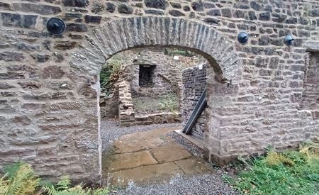 Augill smelting mill view through arch into interior